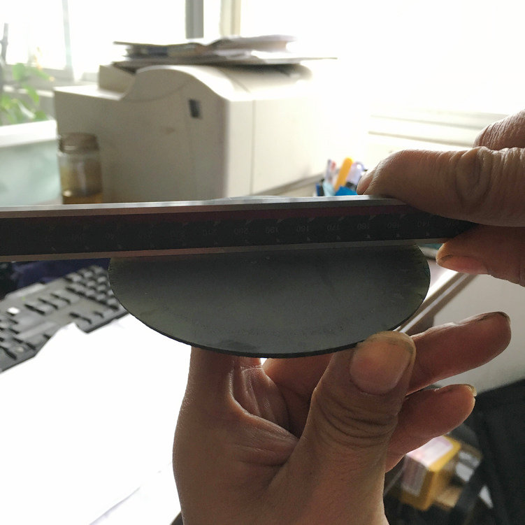 加工實例：泰州晨虹CHSX5620-XW數(shù)控金剛石線雙絲筒機床切割直徑100mm碳化硅效果